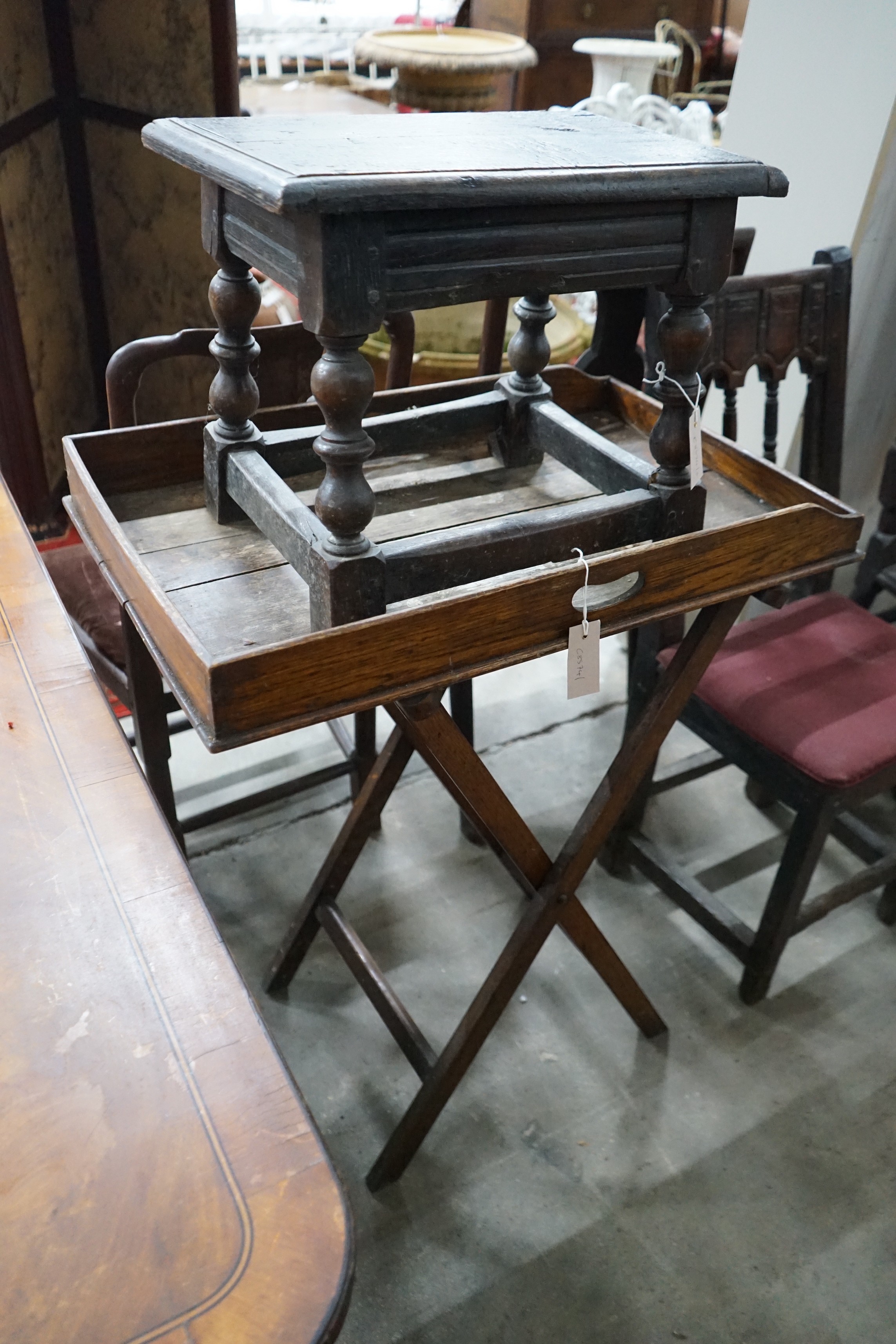 An early 18th century style oak joint stool, width 46cm, depth 30cm, height 38cm and a Victorian butler's tray on stand